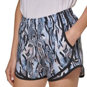 Calvin Klein Ladies Active Short in Animal Mix print. Size: Medium.